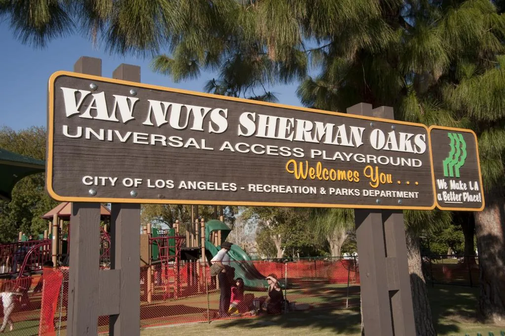 Entrance sign of the Van Nuys Sherman Oaks Universal Access Playground, a City of Los Angeles Recreation and Parks playground in Van Nuys